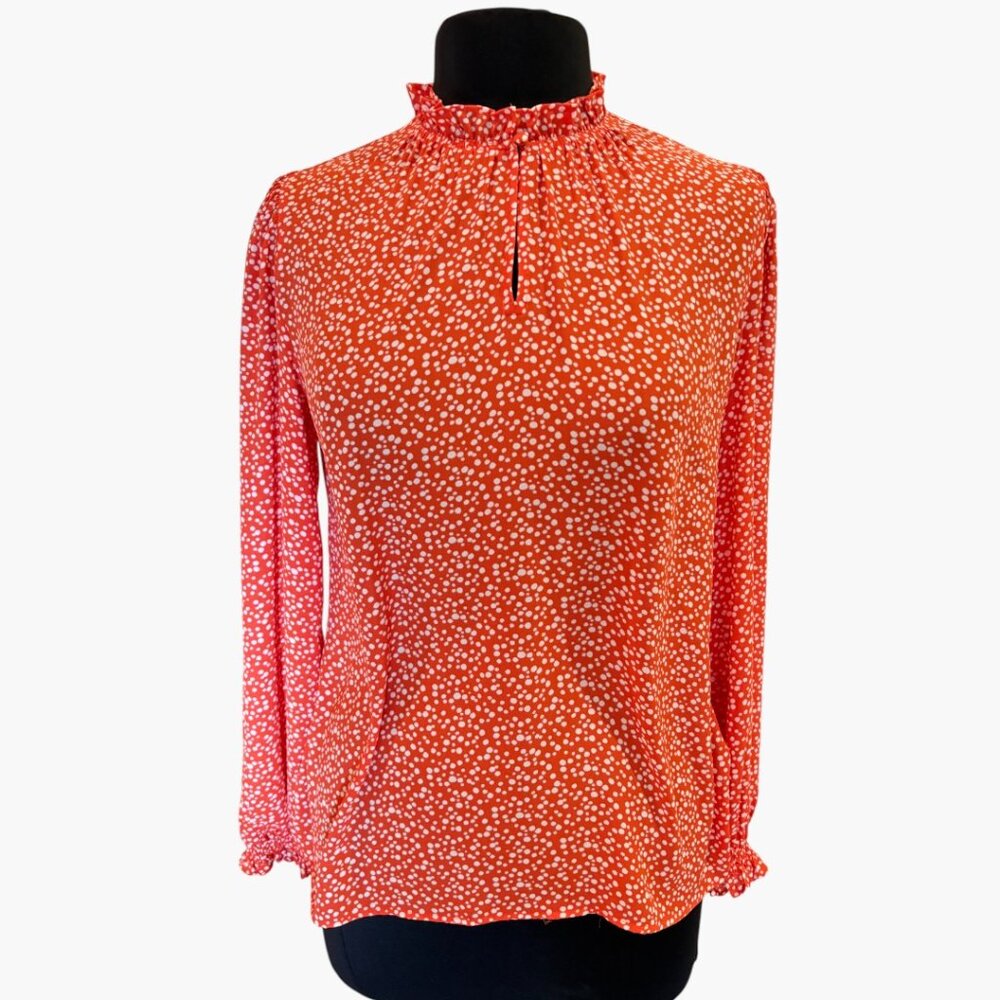 Ann Taylor speckled high-neck long-sleeve blouse.